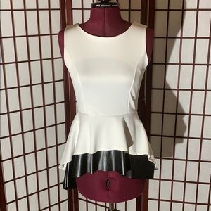 Long white and black peplum blouse
